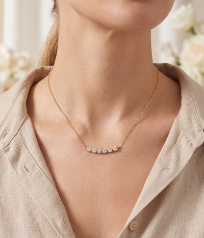 lumina forge eternal wave moissanite necklace in yellow gold finish — model view