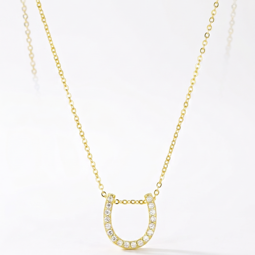lumina forge lucky horseshoe moissanite necklace in yellow gold finish — front view