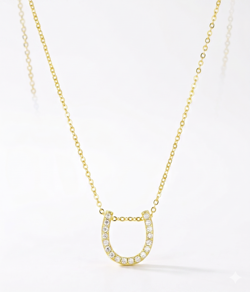 lumina forge lucky horseshoe moissanite necklace in yellow gold finish — front view