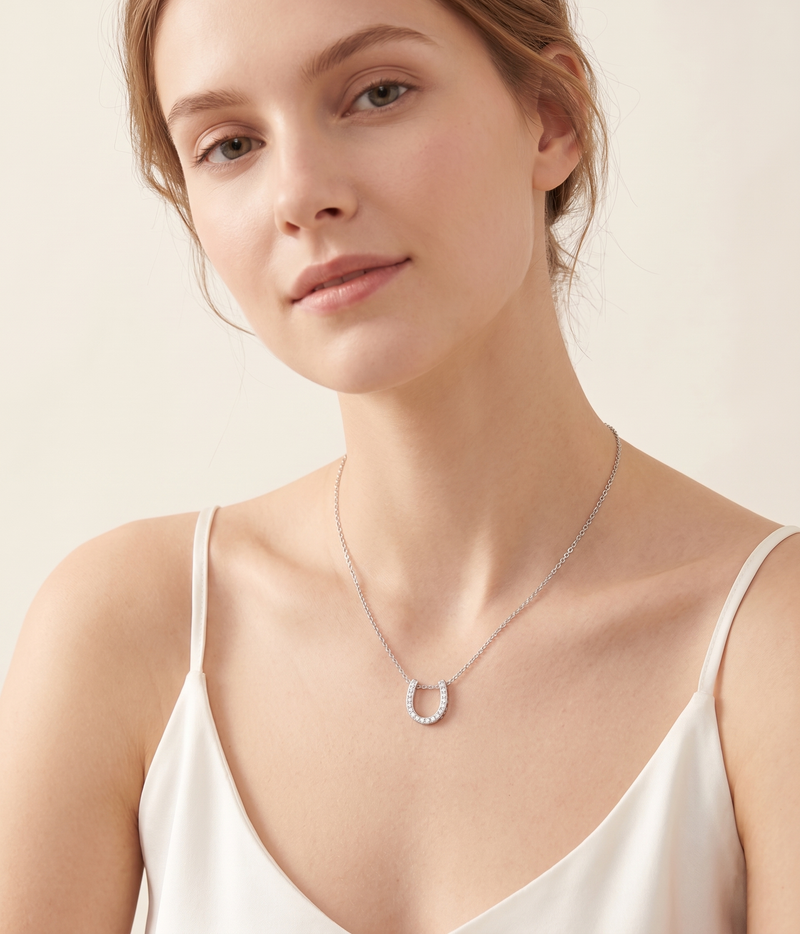 lumina forge lucky horseshoe moissanite necklace in white gold finish — model view