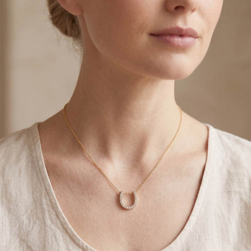 lumina forge lucky horseshoe moissanite necklace in yellow gold finish — model view