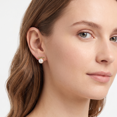 lumina pearl bar stud earrings in yellow gold finish — model view