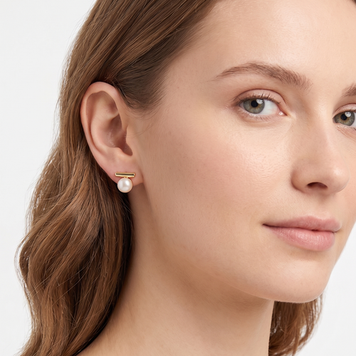 lumina pearl bar stud earrings in yellow gold finish — model view