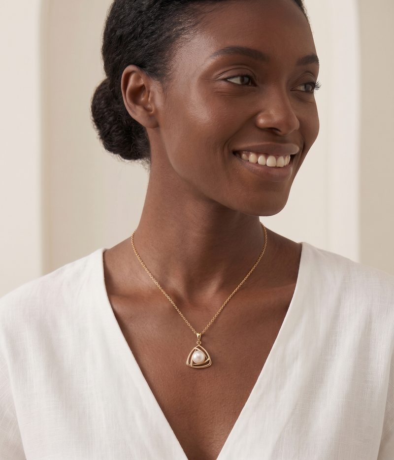 lumina pearl triangle pendant necklace in yellow gold finish — model view