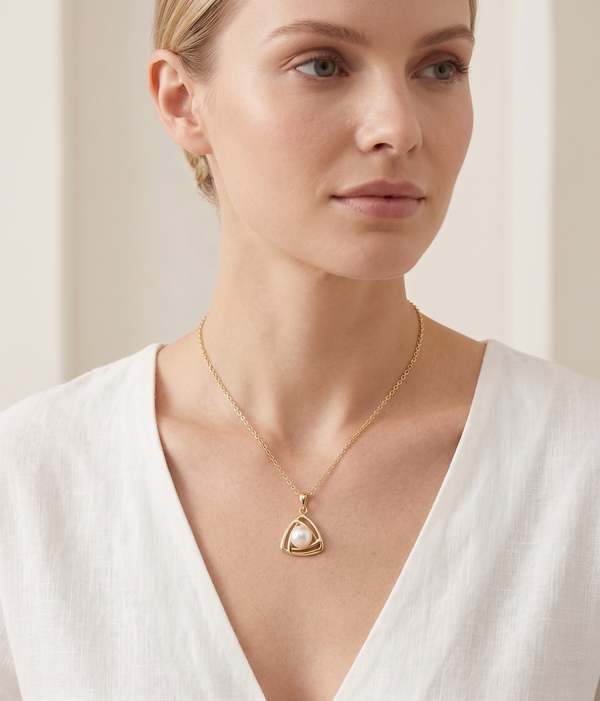 lumina pearl triangle pendant necklace in yellow gold finish — model view