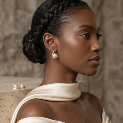 lumina pearl teardrop stud earrings in yellow gold finish — model view
