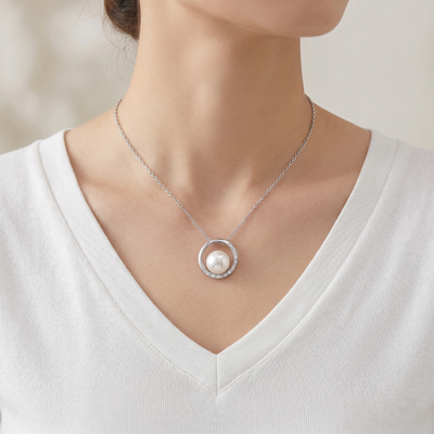 lumina pearl orbit pendant necklace in white gold finish — model view