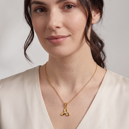 triple petal pendant necklace in yellow gold finish — model view