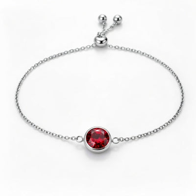 garnet birthstone bracelet in white gold finish — front view
