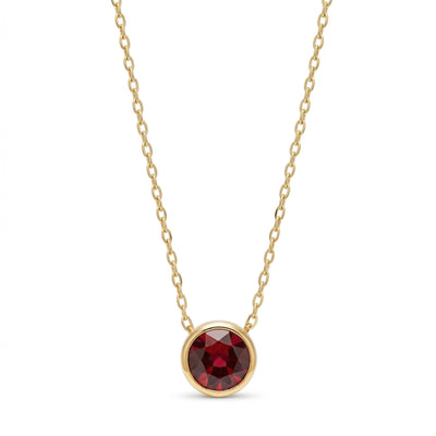 garnet birthstone necklace in yellow gold finish — front view