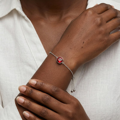 garnet birthstone bracelet in white gold finish — model view
