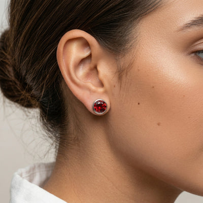 garnet birthstone stud earrings in white gold finish — model view