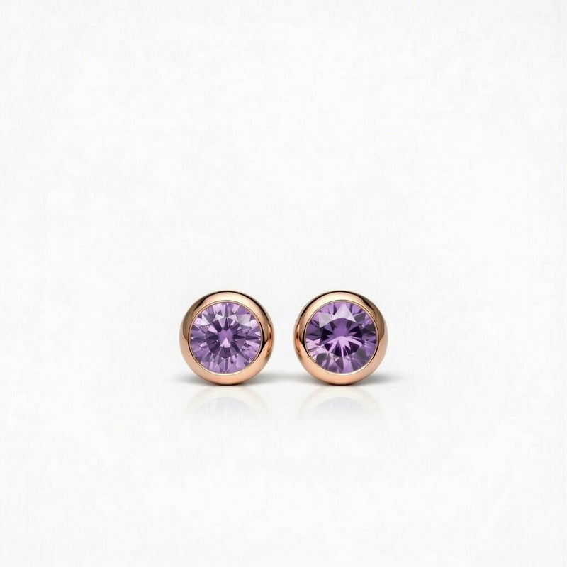 amethyst birthstone stud earrings in rose gold finish — front view