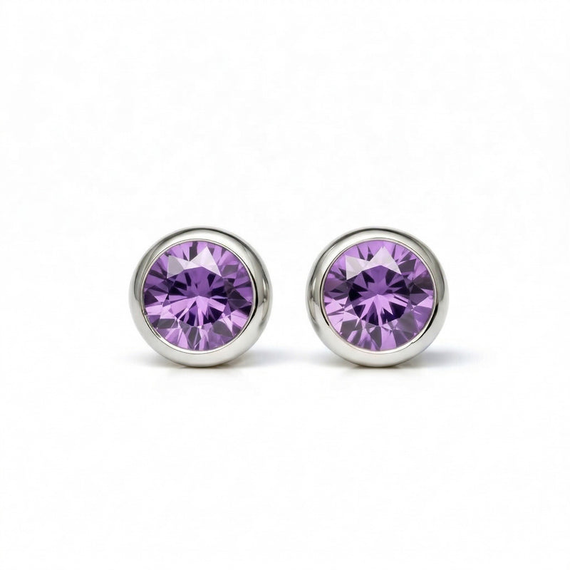 amethyst birthstone stud earrings in white gold finish — front view