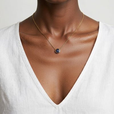 amethyst birthstone necklace in yellow gold finish — model view
