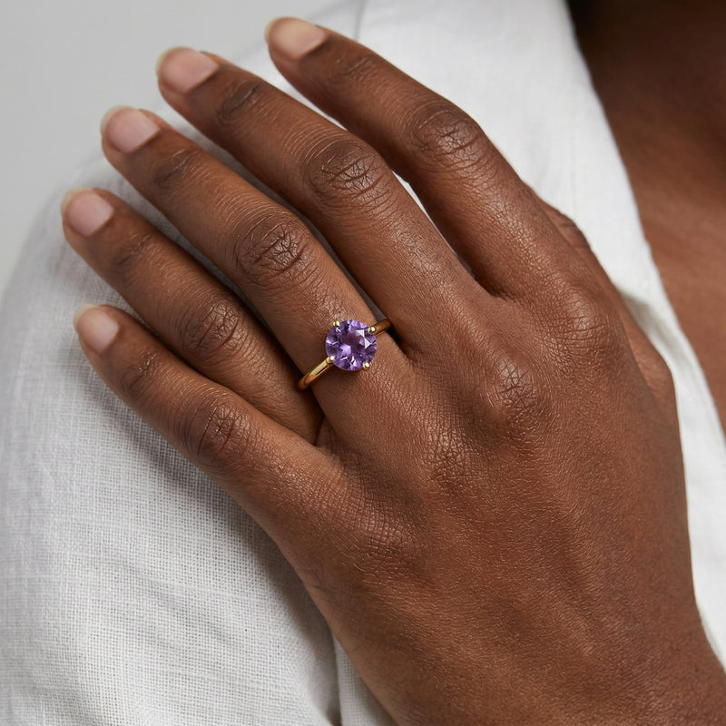 amethyst birthstone ring in yellow gold finish — model view