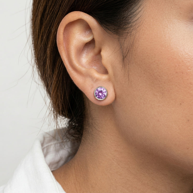 amethyst birthstone stud earrings in white gold finish — model view