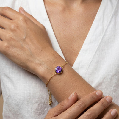 amethyst birthstone bracelet in yellow gold finish — model view