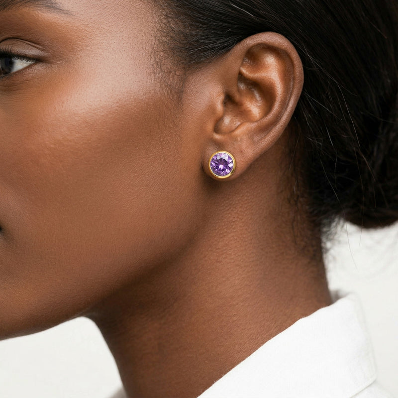 amethyst birthstone stud earrings in yellow gold finish — model view