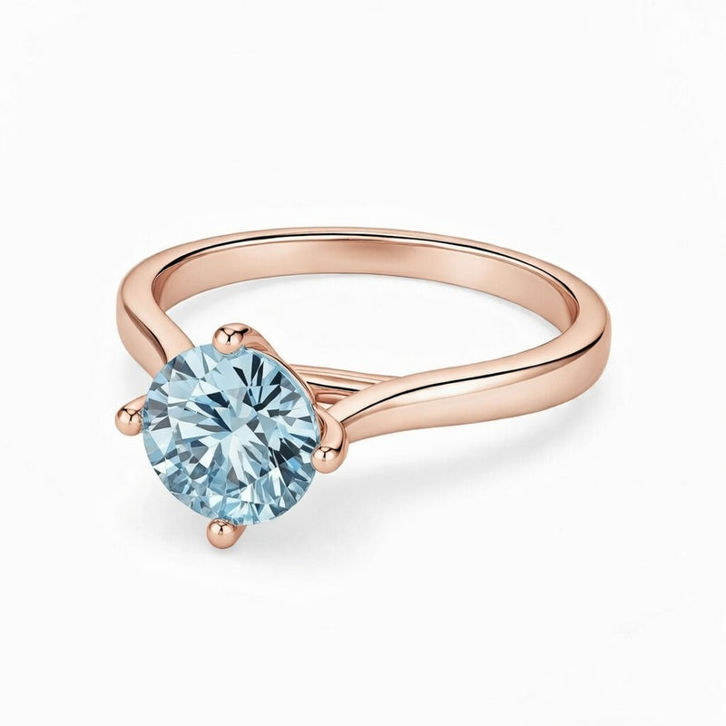 aquamarine birthstone ring in rose gold finish — front view