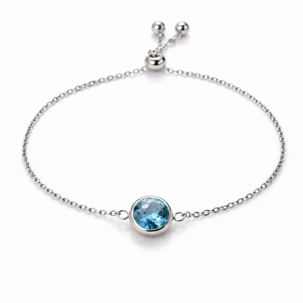 aquamarine birthstone bracelet in white gold finish — front view