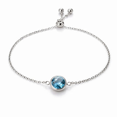 aquamarine birthstone bracelet in white gold finish — front view