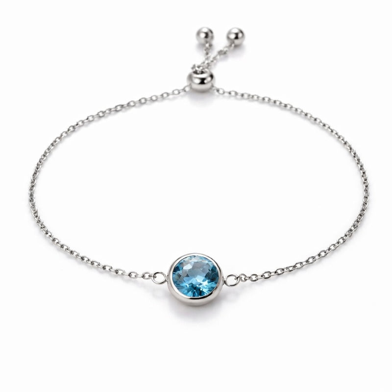 aquamarine birthstone bracelet in white gold finish — front view