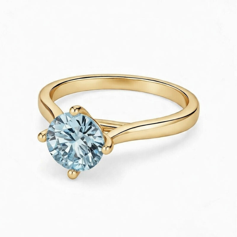 aquamarine birthstone ring in yellow gold finish — front view