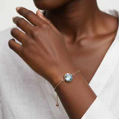 aquamarine birthstone bracelet in rose gold finish — model view