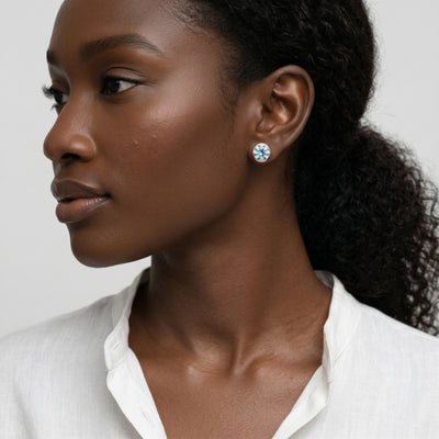 aquamarine birthstone stud earrings in rose gold finish — model view