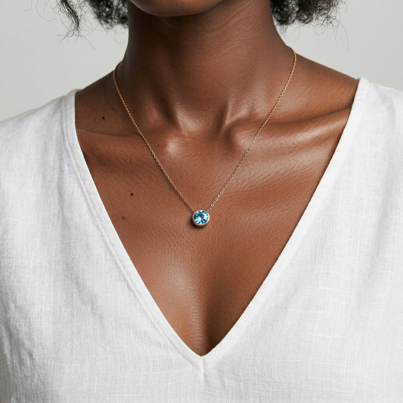 aquamarine birthstone necklace in rose gold finish — model view