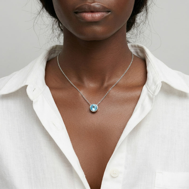 aquamarine birthstone necklace in white gold finish — model view