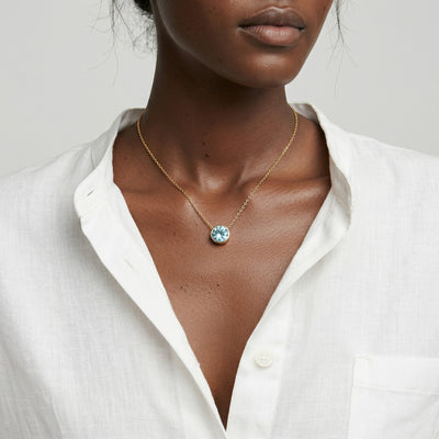 aquamarine birthstone necklace in yellow gold finish — model view