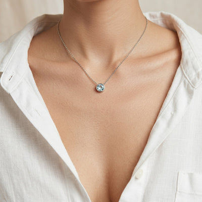 aquamarine birthstone necklace in white gold finish — model view