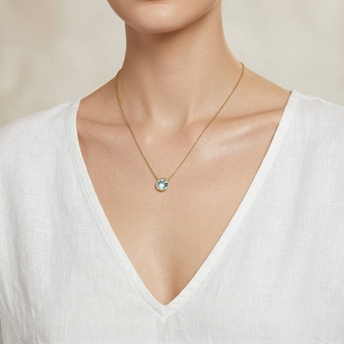 aquamarine birthstone necklace in yellow gold finish — model view