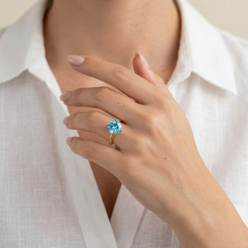 aquamarine birthstone ring in yellow gold finish — model view