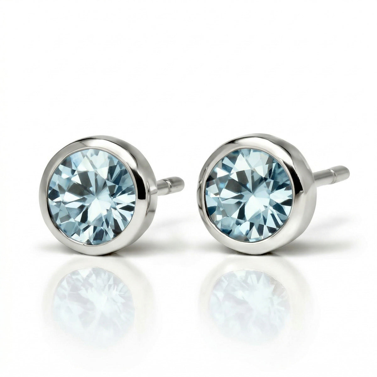 aquamarine birthstone stud earrings in white gold finish — side view