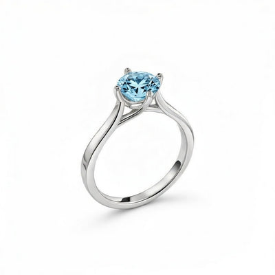 aquamarine birthstone ring in white gold finish — side view
