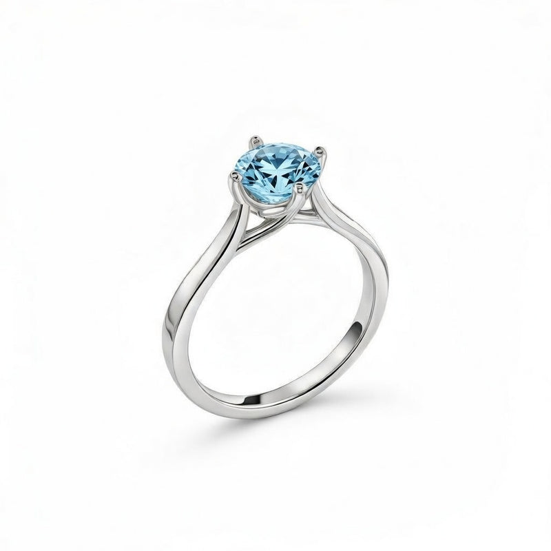 aquamarine birthstone ring in white gold finish — side view