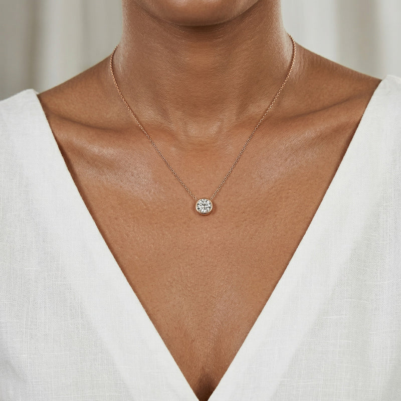 diamond birthstone necklace in rose gold finish — model view