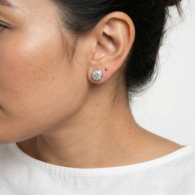diamond birthstone stud earrings in white gold finish — model view