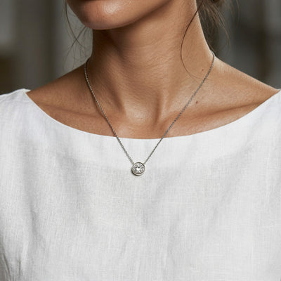 diamond birthstone necklace in white gold finish — model view