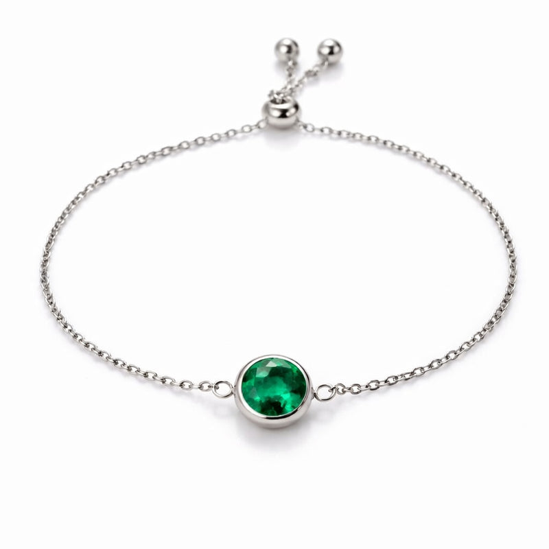emerald birthstone bracelet in white gold finish — front view