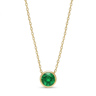 emerald birthstone necklace in yellow gold finish — front view