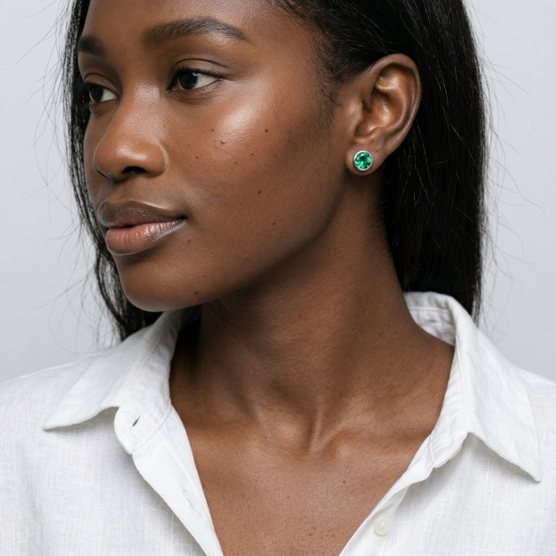 emerald birthstone stud earrings in white gold finish — model view