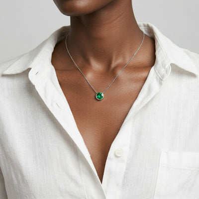 emerald birthstone necklace in white gold finish — model view
