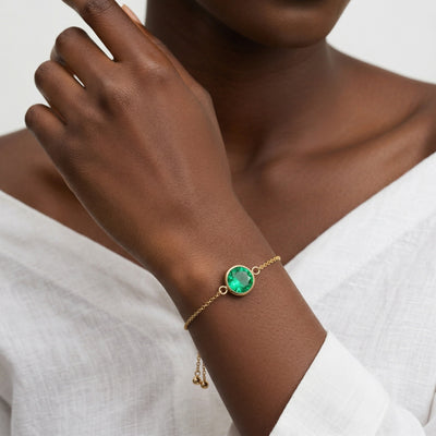 emerald birthstone bracelet in yellow gold finish — model view
