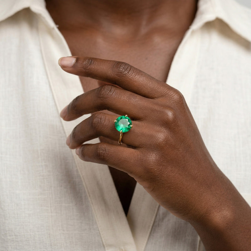 emerald birthstone ring in yellow gold finish — model view