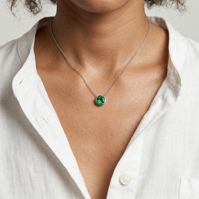 emerald birthstone necklace in white gold finish — model view