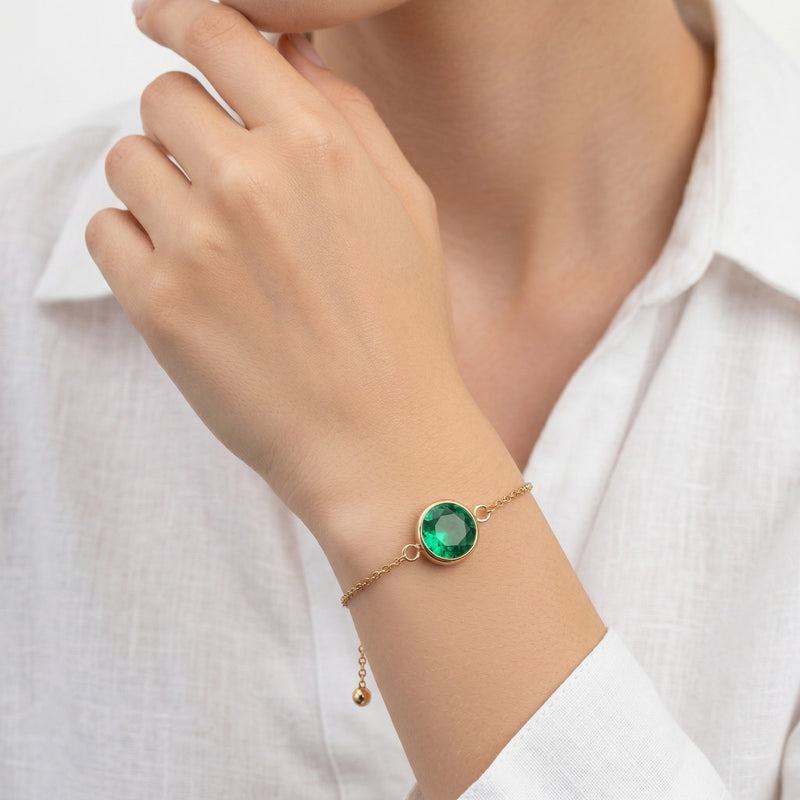 emerald birthstone bracelet in yellow gold finish — model view